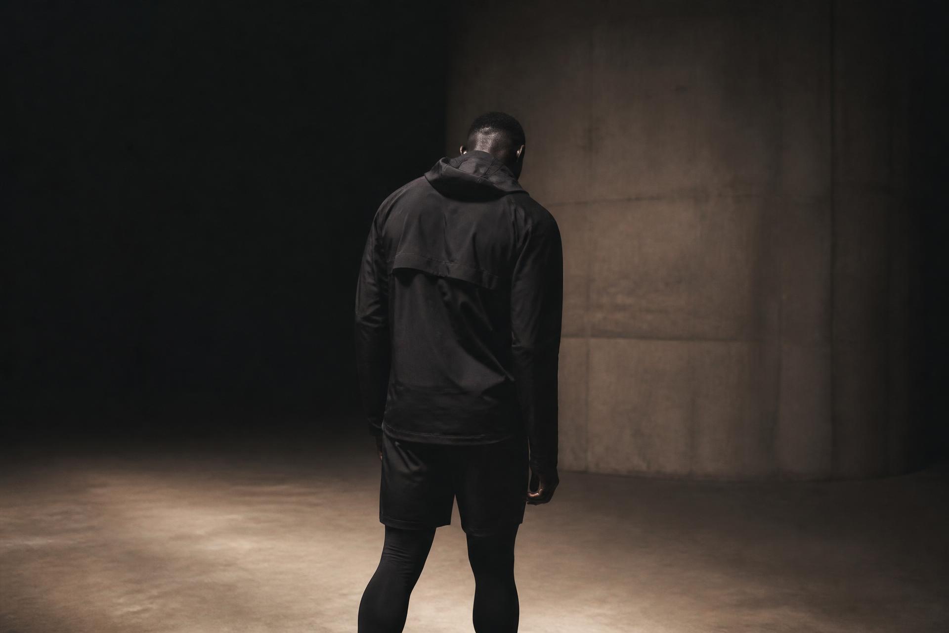 RAYW campaign — athlete in dark technical apparel